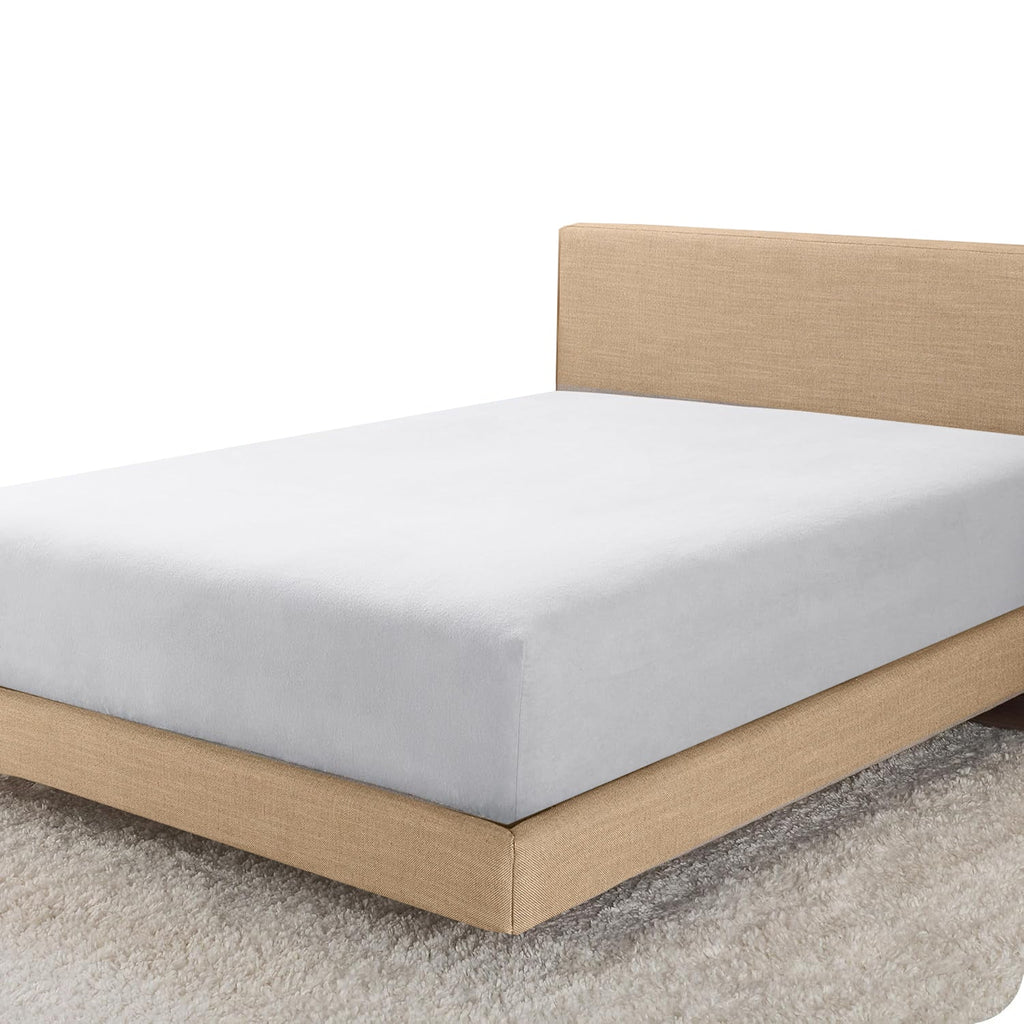 White brushed microfibre fitted sheet on a bed base