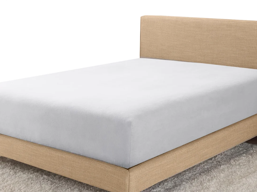White brushed microfibre fitted sheet on a bed base